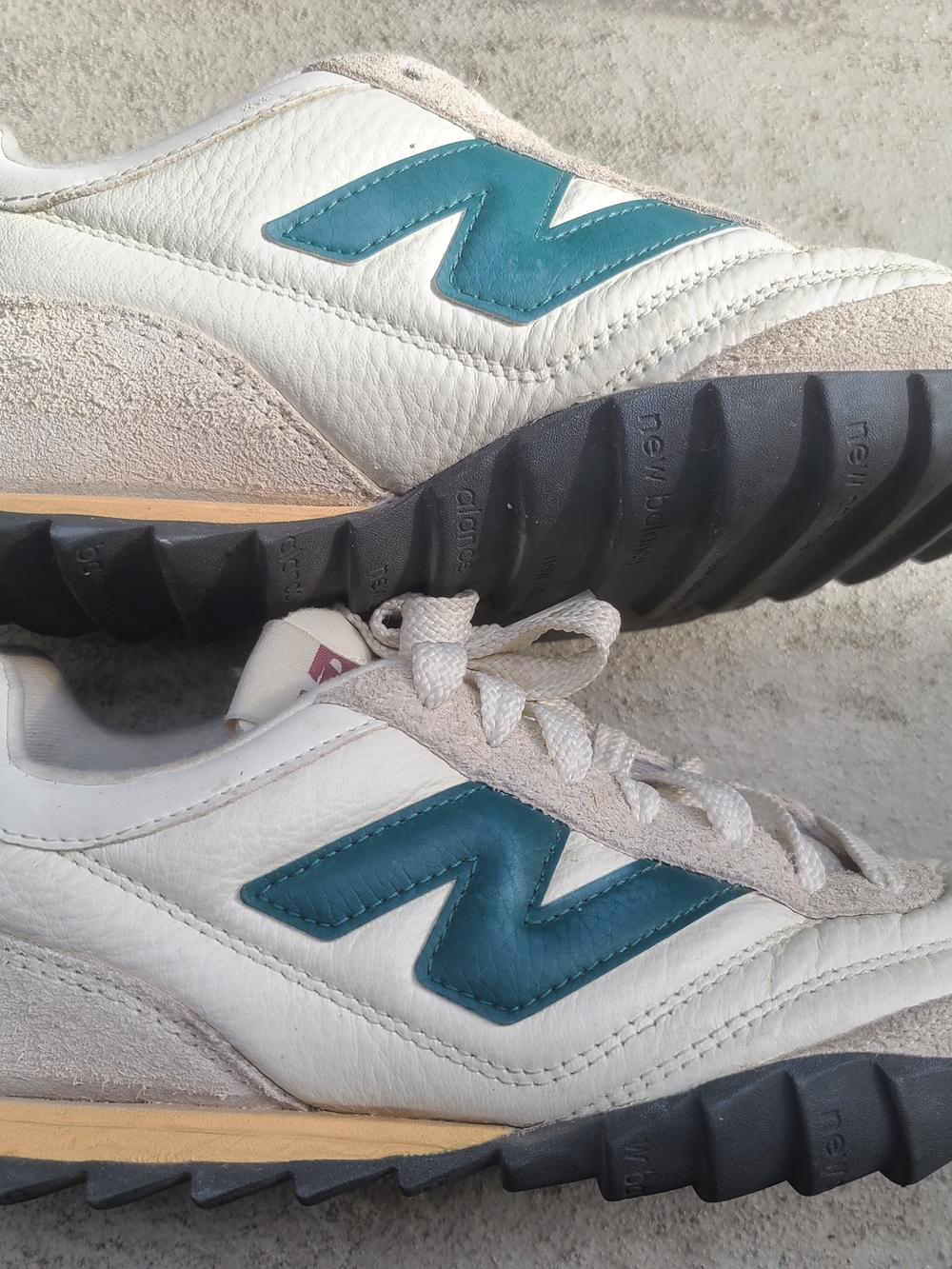 New Balance White Leather Sneakers with Teal Logo